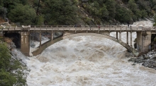 Flood_under_the_Old_Route_49_bridge_crossing_over_the_South_Yuba_River_in_Nevada_City,_California.jpg